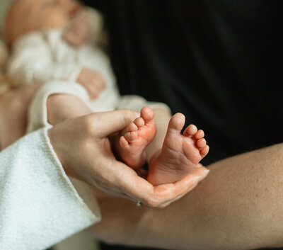 Relaxed newborn photo session at client's home in Winnipeg