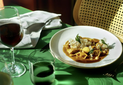 table setting with a bowl of pasta