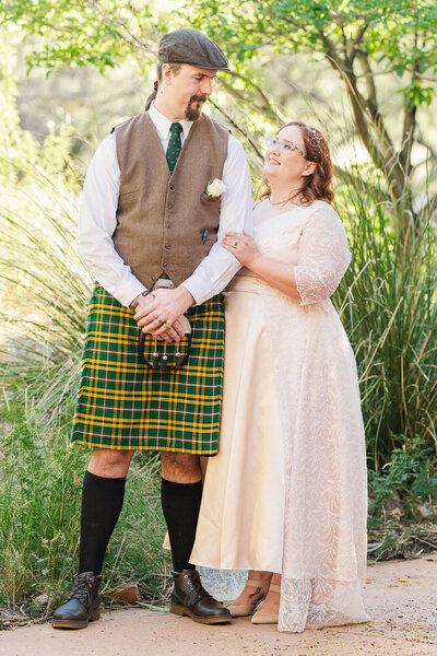 couple holding hands in gardens at Kartchner Caverns State Park