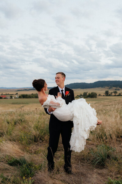 Rylie holding Tayhgen in Belle Fourche, South Dakota.