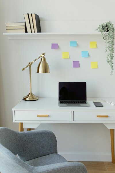 Desk-with-laptop-cost-free-employee-healthcare-new-mexico