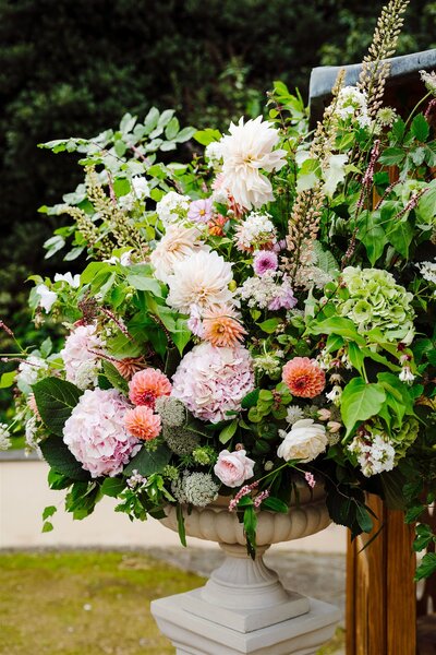 Clevedon Hall, outdoor ceremony, floral urns 