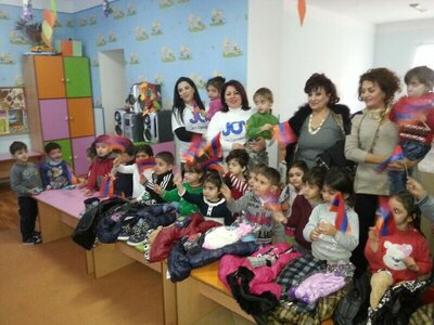 JOY volunteers photo with children