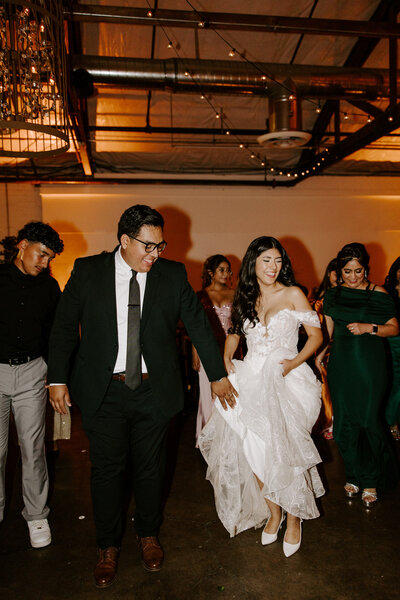 A couple dances on the dance floor
