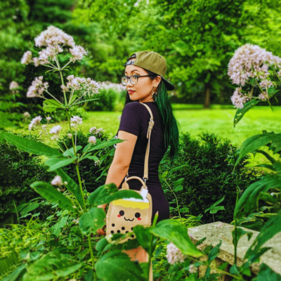 Libra Designer with Green Hair Holding Boba Purse