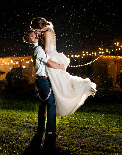 Bride and groom kissing in the rain, Baltimore Maryland Wedding Photography
