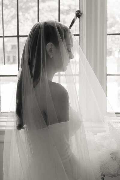 Candid portrait of a bride before her wedding ceremony at the Grace & Holy Trinity Episcopal Church in Richmond, Virginia