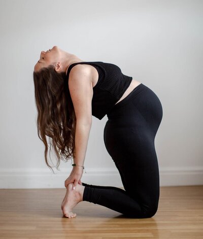 Mariella in a camel pose
