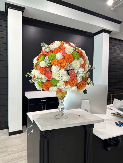 Orange and white large floral arrangement