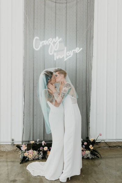 Crazy in love holographic wedding inspiration with 'crazy in love' neon sign by Stef Forward Events, trendy and modern decor rentals based in Calgary, AB. Featured on the Brontë Bride Blog.