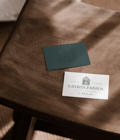business cards laying on table with shadow overlay