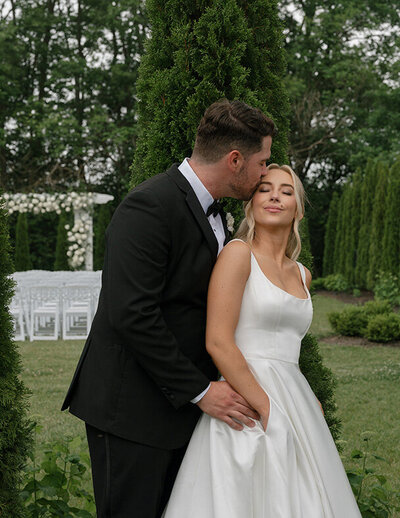 Wedding photographer capturing moments during a black tie reception, showcasing a beautiful Columbus, Ohio wedding celebration.