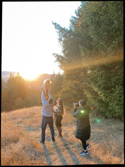 Family Photographer taking photos of family during golden hour in Corvallis, OR. 