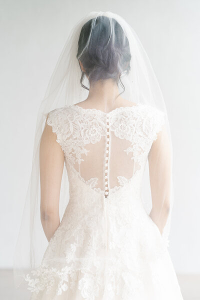The back of a bride's wedding gown