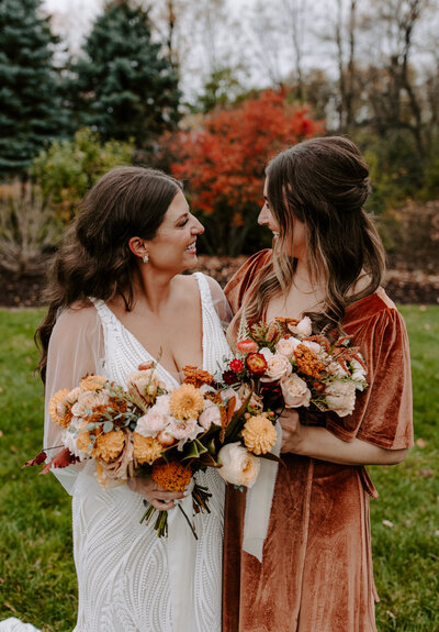 woman holding eucalyptus bouquet