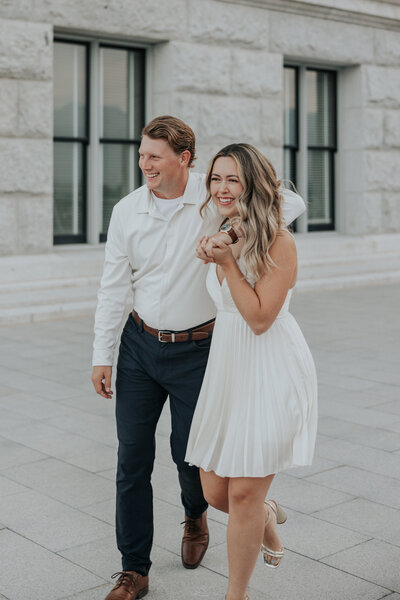 Engaged Couple Walking and laughing