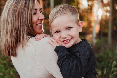 woman holding baby on her lap