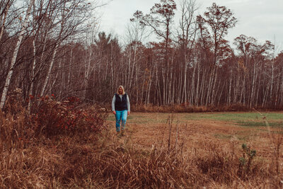 Kristina walking her woods