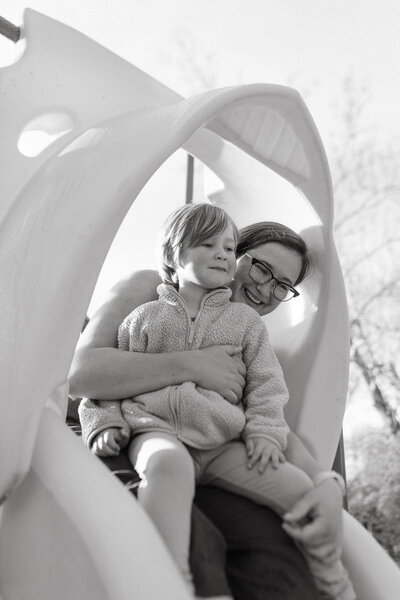 Boy and mom playing at park in Iowa City