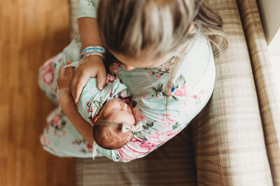 new mom holding baby girl at york hospital