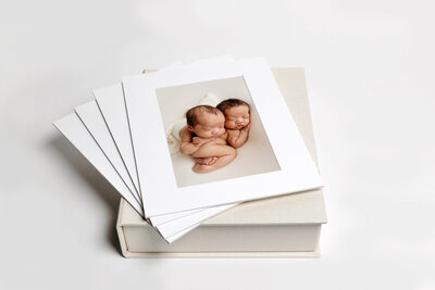 Matted print box with new born portraits by auckland newborn photographer michelle kelly