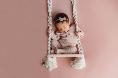 Infant posed for Newborn Photos in Charleston, SC.