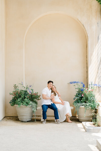 A couple sitting on a bench at Longwood Gardens