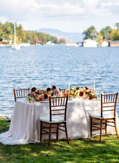 Lush dahlia centerpiece with  burgundy, peach and blush