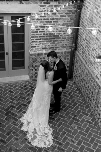 Couple kissing to show cinematography by florida wedding videographer