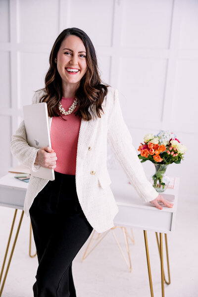 Stephanie Seija Content Marketing - woman holding laptop