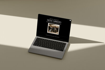 Conversion-focused desktop website design by Ruby Works Co.™ on a neutral-toned laptop, highlighting a bold, high-contrast aesthetic.

