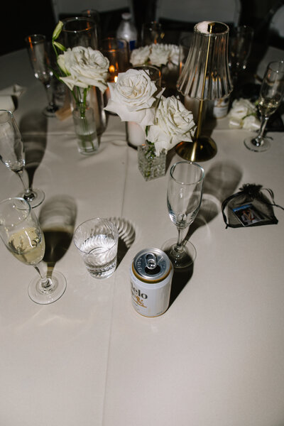 Wedding reception detail photos of the messy tables.