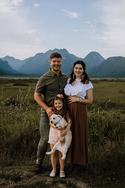 Beautiful family captured with a mountain backdrop at Pitt Lake, Pitt Meadows BC