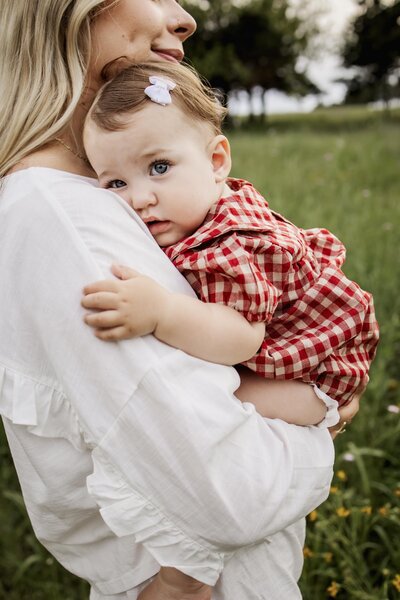 mother with her infant son in Plano texas