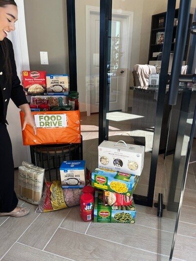 Donated food collected during the three week community food drive organized by WLS Interests to support local residents in Pharr Texas.