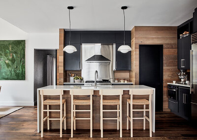 Dining room built-ins in Boston, Massachusetts, showcase custom cabinet design in a Westwood kitchen renovation, with new shelves creating a family-friendly interior.