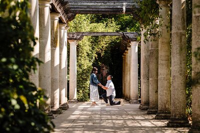 Moments before she said "YES" - he is on one knee asking the big question at the Hill Garden & Pergola.