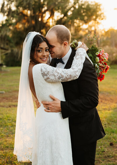 husband and wife  photo at sunset