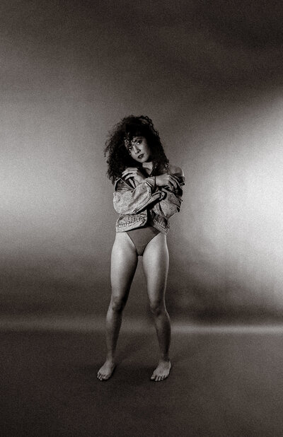 black and white photo of a woman posing