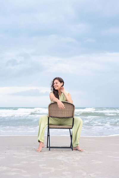 the ultimate boho chair positioned between two walkways with a jute rug in front