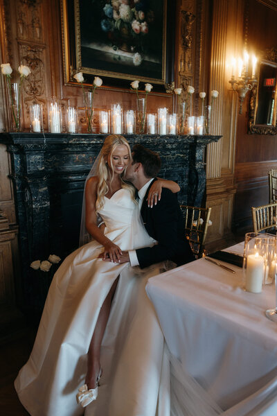 Poetic editorial wedding portrait in a grand luxury venue.