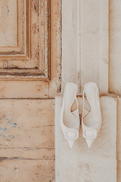 kaboompics_white-high-heeled-open-back-pumps-with-front-embellishment-pointed-toe-ankle-strap-31510-scaled