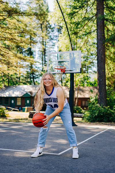 Senior Sports Photos on Basketball court in Glacier National Park