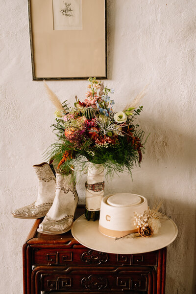 Boots hat and wedding bouquet