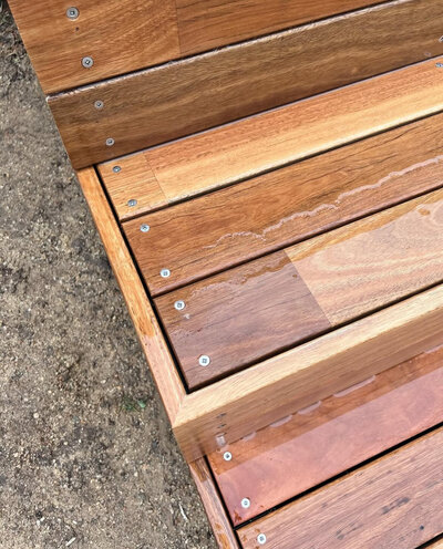 Custom timber deck with built-in seating in Adelaide backyard