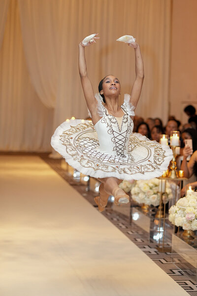 Ballerina performing at a wedding down the ceremony aisle