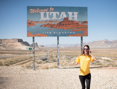women Utah state sign