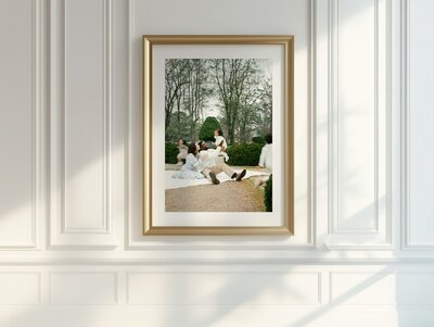 family sits together on picnic blanket in garden in decatur alabama by huntsville alabama photographers