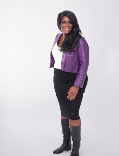 beautiful Black coach wearing a purple leather jacket;; career coaching for Black women