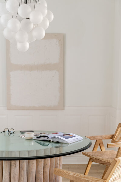 Brown chair and glass table